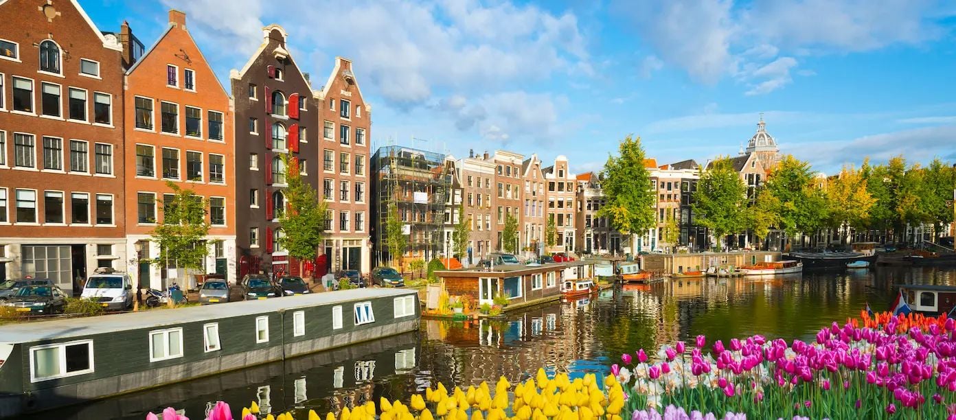 Amsterdam canal view for a guide on recruiting and hiring in the Netherlands