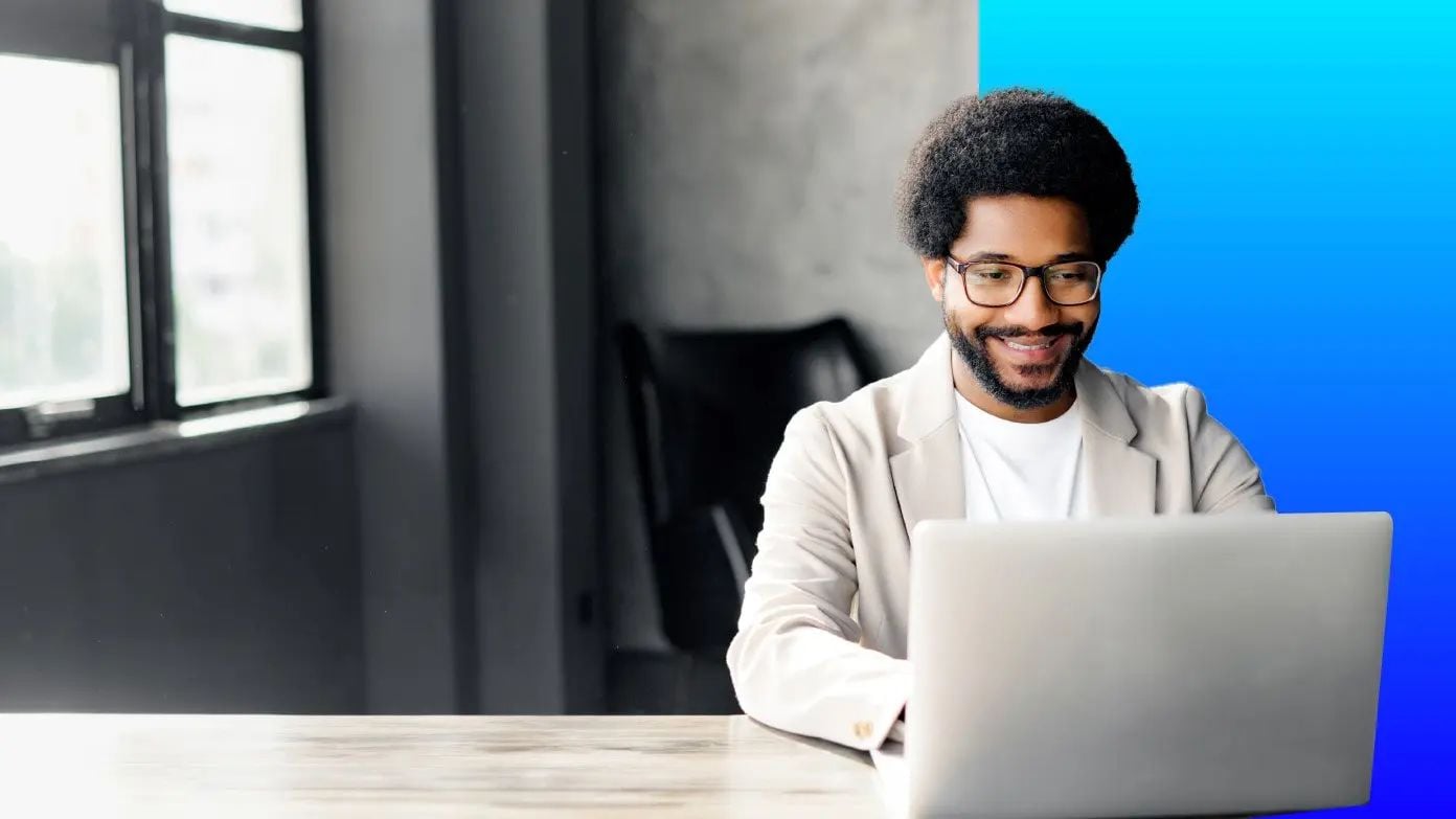 Men working at laptop