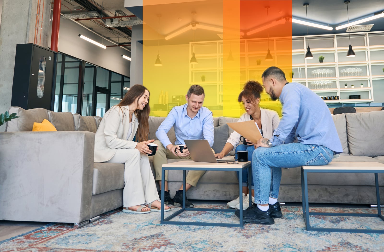 Professionals having a business meeting in a co-working space.