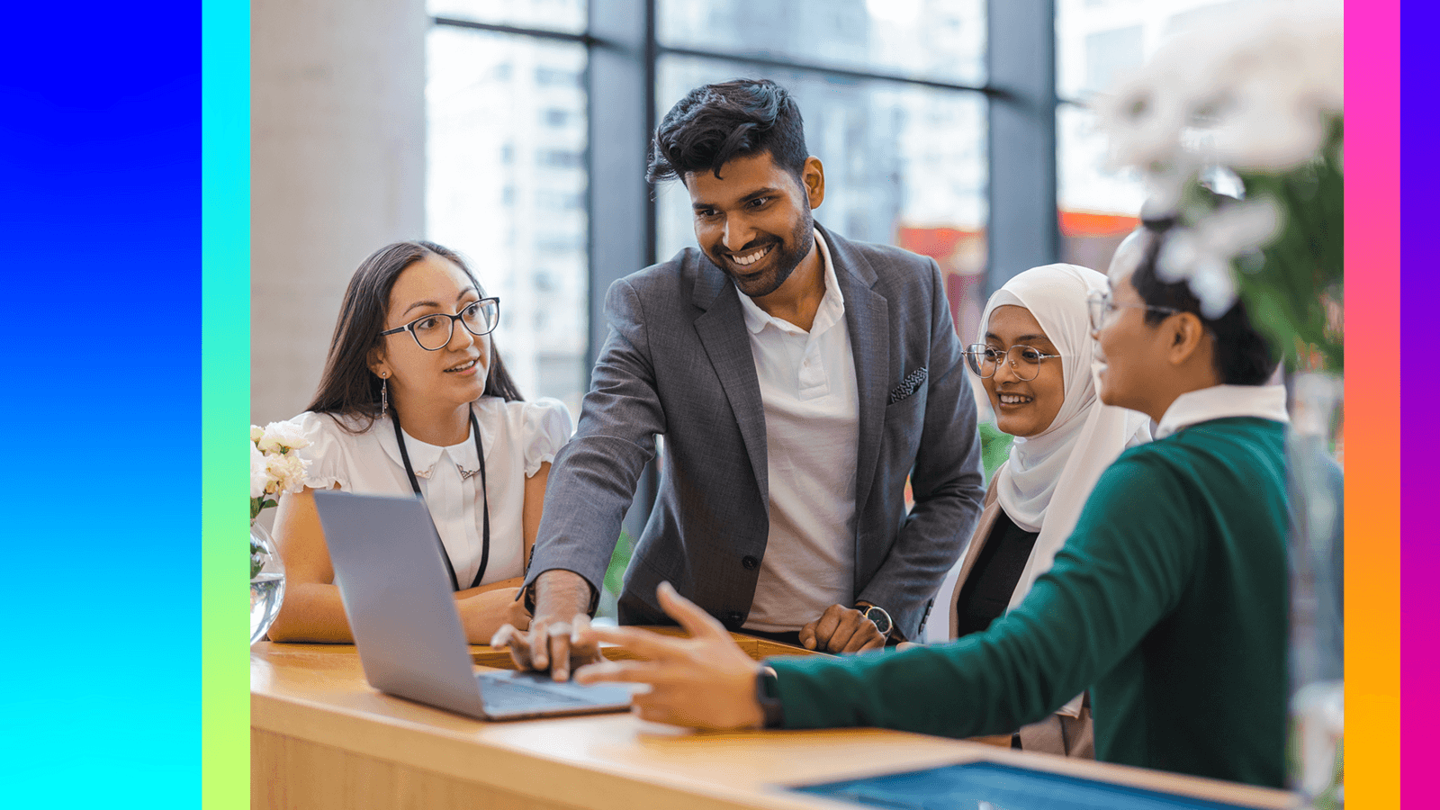 International workers collaborating at a desk