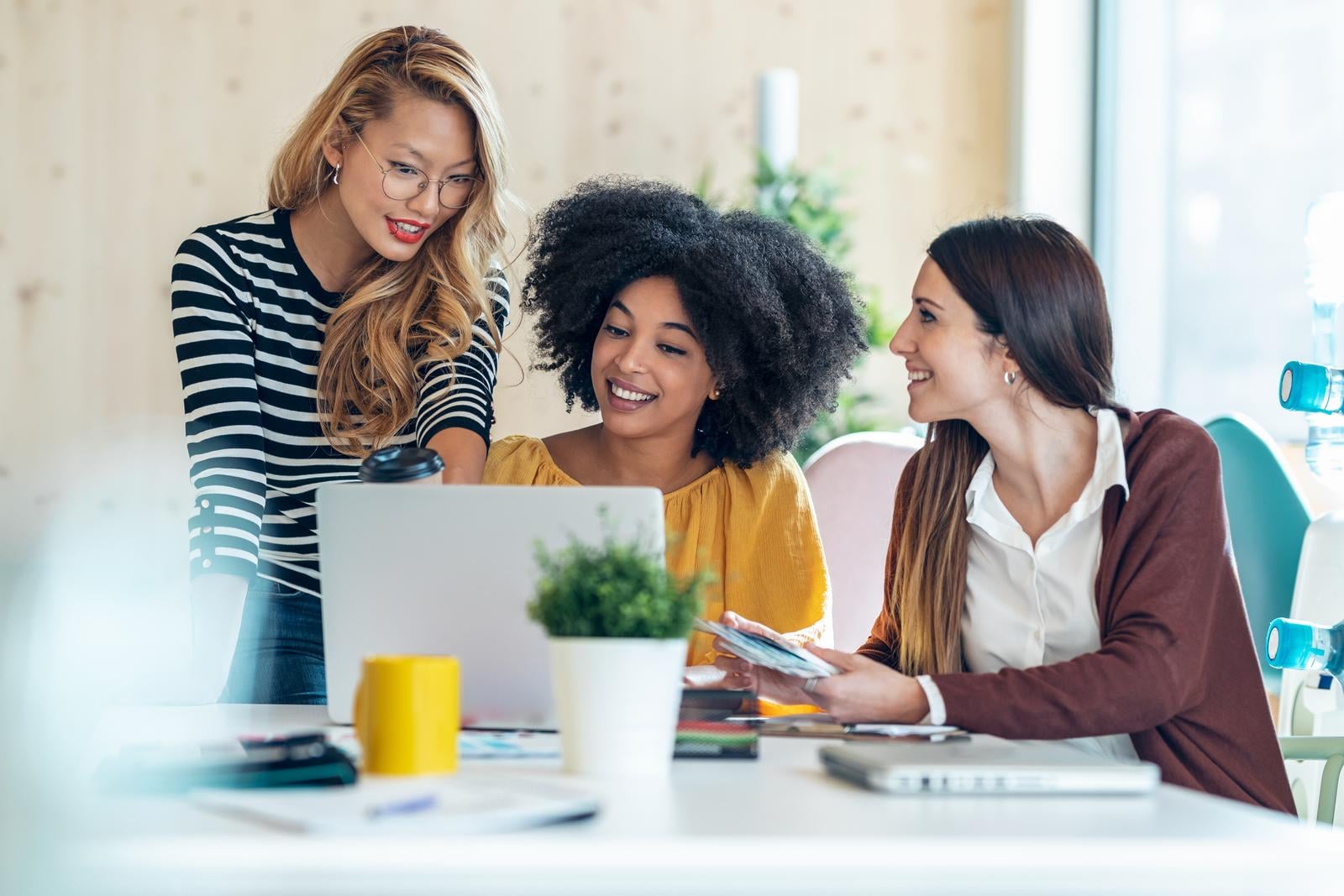 Casual Multiethnic Business Women Working With Laptops While Tal