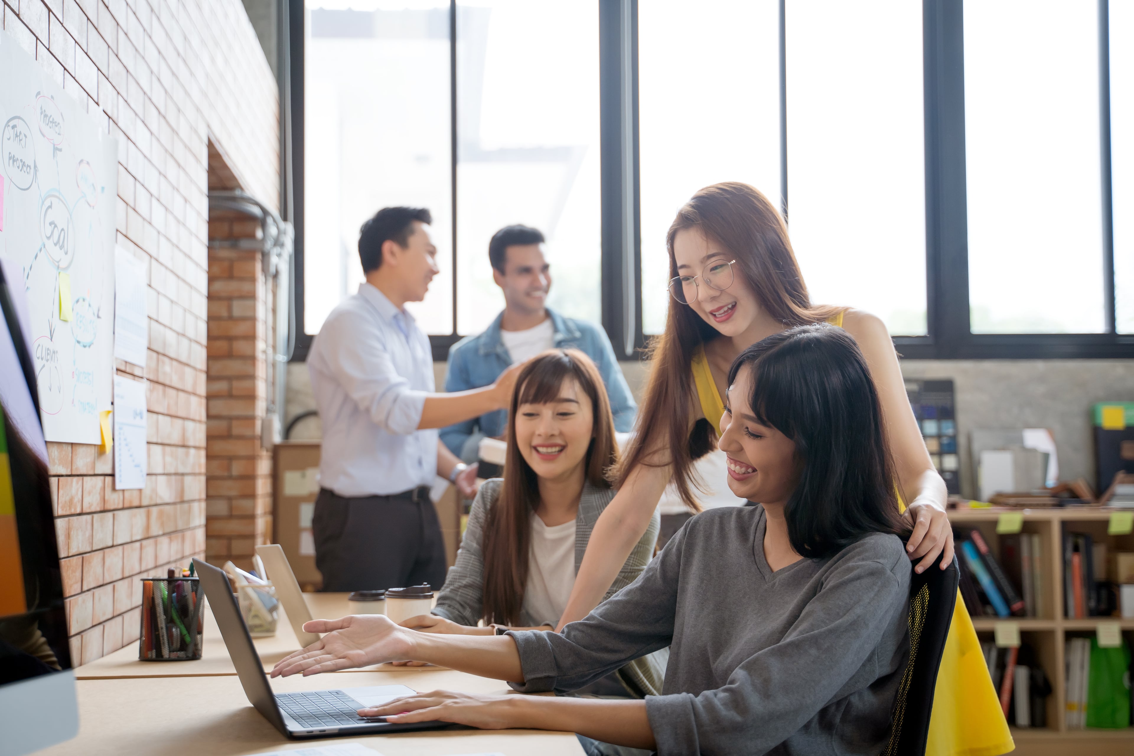 Group Of Asian Business People Team Meeting In Modern Office Wor